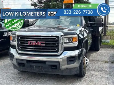 Just arrived on trade! Clean Carfax Report, Accident-free! DEL Power Dump Box! The GMC Sierra HD is...
