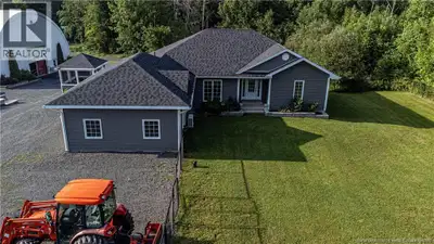 Exceptional equestrian estate offers expansive pastures, 60x120 indoor riding arena, 4-stall barn co...