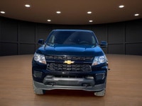The 2022 Chevrolet Colorado 4WD Work Truck attracts attention with its bold Black appearance and rob... (image 1)