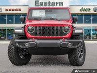 This Jeep Wrangler has a dependable Intercooled Turbo Premium Unleaded I-4 2.0 L/122 engine powering... (image 1)