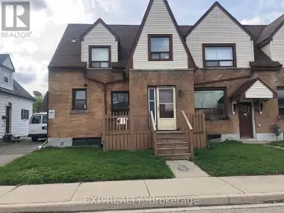 Welcome to Unit 5 at 1 Henderson Ave-a freshly renovated, sun-drenched one-bedroom lower-level resid...