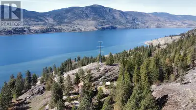 Beautiful natural setting overlooking Skaha Lake, nestled at the end of a cul-de-sac in Heritage Hil...