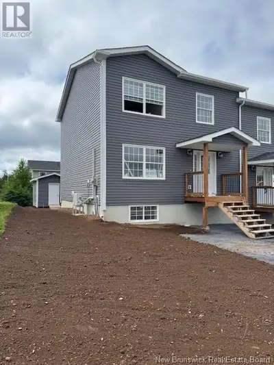 EXECUTIVE 2 STORY SEMI-DETACHED NEW ICF CONSTRUCTION OFFERING 4 BEDROOMS,2.5 BATHROOMS,WITH A FULL F...