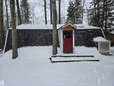 ALMOST LAKEFRONT! THIS REMARKABLE BUNGALOW IS QUAINTLY NESTLED VERY CLOSE TO THE LAKE AND HAS DIRECT...