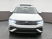 Itâ€™s hard to stand out in a crowd, but the 2024 Volkswagen Tiguan strives to escape the genericism... (image 1)