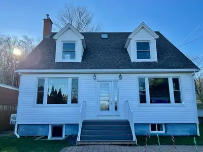 Available July 15, this bright and spacious two-level upper unit is located at 2 Tremont Drive in Ha...
