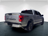 Experience the renowned 2022 Ford F-150 XLT 4x4 SuperCrew in a striking Silver finish, built for bot... (image 8)