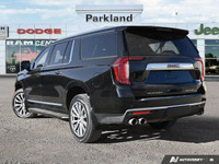 Command the road in this 2022 GMC Yukon XL Denali, a pinnacle of SUV luxury and capability. Boasting... (image 4)