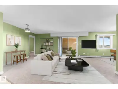 TOP-FLOOR GEM IN PARKDALE! Stylish and move-in ready, this spacious 1-BEDROOM + OPEN DEN condo (pote...