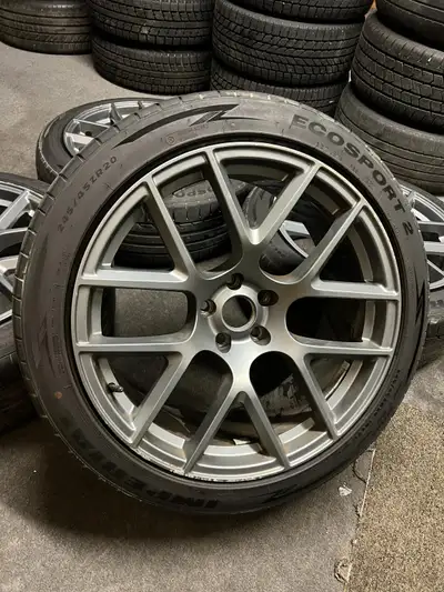 Nice set of Chrysler aftermarket mesh style wheels in gunmetal finish. Has some curbrash but overall...