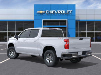 Meet the impressive 2025 Chevrolet Silverado 1500 LT Crew Cab in pristine white, pushing the limits... (image 2)