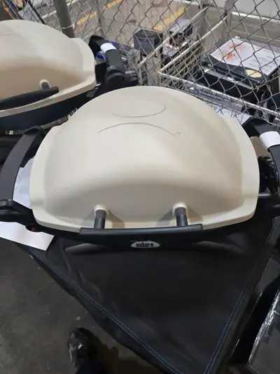 WEBER outdoor liquid propane gas grill featuring 189 square inches of cooking area, porcelain-enamel...