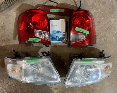 Headlights, Taillights, Front bumper cover with fog lamps and set of 4 tires on rims for sale. Tires...