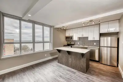 8787 Riverside | Experience elevated living in this stunning modern two-bedroom + den apartment on R...