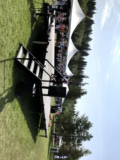 Renting mobile STAGE 24’ x 24‘ when set up in the filed. during, View more