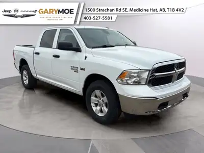 Presenting the stunning 2023 Ram 1500 Classic SLT 4x4 Crew Cab in an elegant White finish, paired wi...