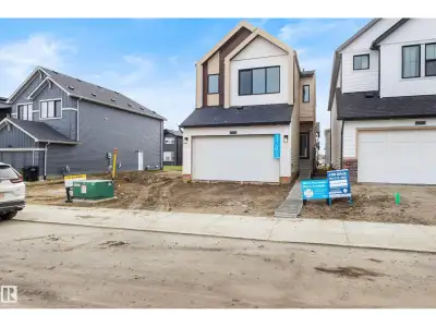 A BRAND NEW double attached garage home, located in the desirable community of EDGEMONT. The CYPRESS...
