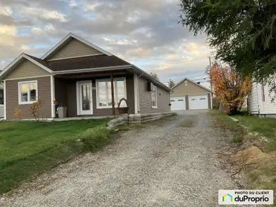 Maison de plain-pied clé en main avec garage double chauffé Construction récente 2012 Quartier famil...