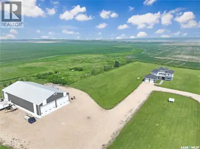 10 acres HOUSE & SHOP Tucked across HWY 13 with the panoramic moose mountain views is the HWY13 pack...