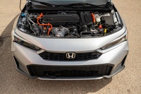 Passenger Illuminated Visor Mirror,Traction Control,Heated Mirrors,Pass-Through Rear Seat,Power Stee... (image 9)