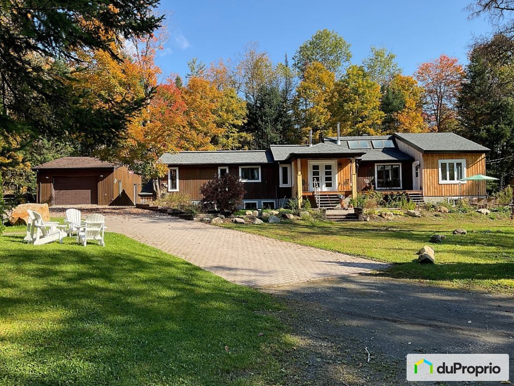 $798,000 - Raised Bungalow for sale in Ste-Adele — photo 1