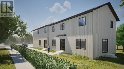 Turn-key, brand new investment opportunity! This newly built legal fourplex sits on a prominent corn...
