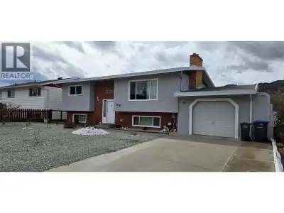 Affordable home just minutes' walk to town, beach & schools. Thoughtfully updated and meticulously k...