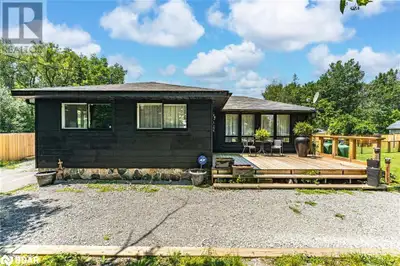 LAKE LIFE STARTS HERE! UPDATED HOME ON OVER HALF AN ACRE WITH A DETACHED GARAGE! Motivated Seller! S...