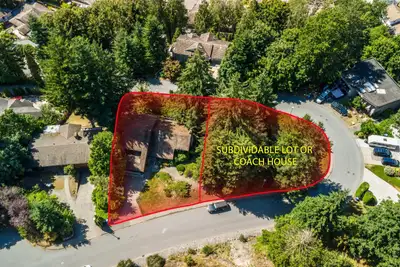 A SUBDIVIDABLE PARK IN THE CITY!..................... Just short of a 1/2 Acre of nature, park and t...