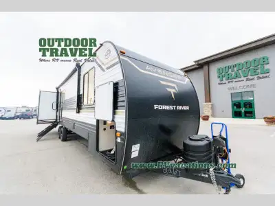 Prime Time Avenger travel trailer 30PO highlights: Triple Slides Sofa with Moveable Storage Ottoman...