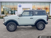 Propel your adventures with the formidable 2021 Ford Bronco. This remarkable used convertible, finis... (image 1)