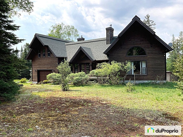 $899,000 - 2 Storey for sale in Ste-Marguerite-Du-Lac-Masson — photo 1