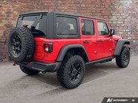 This Jeep Wrangler delivers a Regular Unleaded V-6 3.6 L/220 engine powering this Manual transmissio... (image 3)