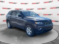 This outstanding example of a 2015 Jeep Grand Cherokee Laredo is offered by Stampede Auto. The Jeep... (image 6)