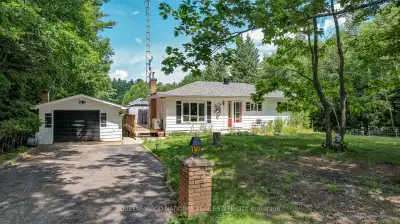 This is a very attractive year round home. Paved driveway to a detached garage with a lower level fo...