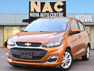 This 2019 Chevrolet Spark is a stylish and reliable hatchback with a sleek gold exterior and a comfo...