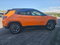 For a quick response please text 403-820-9940. AMVIC licensed business The 2026 Jeep Compass Trailha... (image 5)
