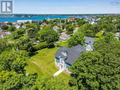Welcome to 42 Queen Street - a stately Classic Revival residence with rich history and timeless eleg...