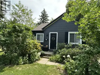 Charming 2+1 bedroom bungalow on a picturesque lot. Nestled in perennial gardens including a pretty...
