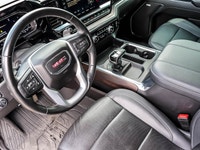 The 2023 GMC Sierra 1500 SLT Crew Cab Short Box 4-Wheel Drive in a refined gray finish offers except... (image 9)
