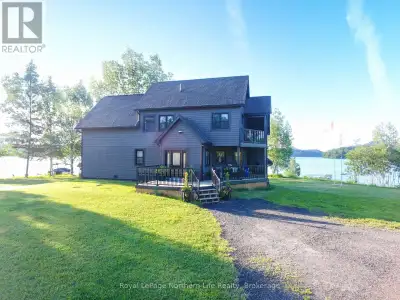 Situated on the coveted Cassells/ Rabbit lake water system sits this stunning luxury property with o...