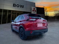 The 2026 Mitsubishi Eclipse Cross NOIR 44 in the NOIR S-AWC trim offers a bold presence with its sop... (image 6)