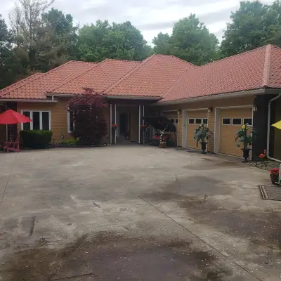 On 1.5 acres, beautiful trees, Private Lot. On street with 30 homes. No visible neighbours. Winding...