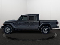 This 2026 JEEP GLADIATOR SPORT 4X4 has the following options Cloth Low-Back Bucket Seats, Remote Sta... (image 1)