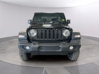 Get ready to explore the great outdoors with the 2026 Jeep Wrangler Sport 2 Door 4x4, stunningly dre... (image 6)