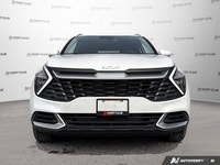 Experience the practicality and reliability of a 2023 Kia Sportage LX, boasting a sleek white exteri... (image 9)
