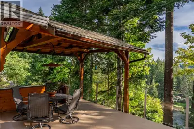 Elegant Riverfront, 3,700 sq.ft residence, on over half an acre, complete with a mortgage helper 1-b...