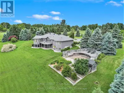 Executive Custom-Built Home Located on the South Branch of the Rideau River, this exceptional home o...