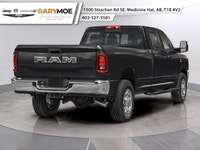 The 2026 Ram 3500 Big Horn, in a striking black finish, is the perfect blend of power and precision.... (image 1)