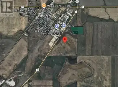 Great opportunity to own land next to the Village of Beiseker, totaling 128.57 Acres of land. Recent...